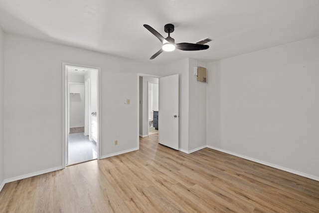 10001 Woodglen Dr, Austin, TX 78753 - unfurnished bedroom with light wood finished floors and ceiling fan