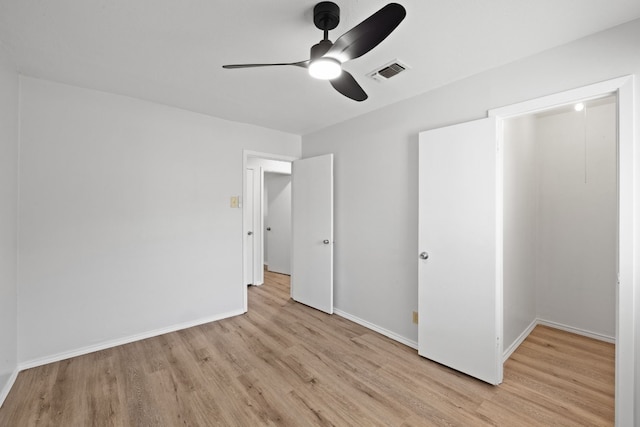 10001 Woodglen Dr, Austin, TX 78753 - unfurnished bedroom with light wood finished floors and a ceiling fan