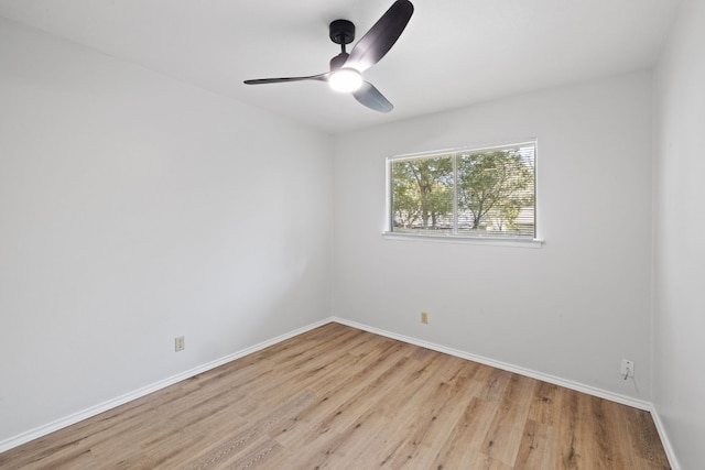 10001 Woodglen Dr, Austin, TX 78753 - empty room featuring wood finished floors and ceiling fan