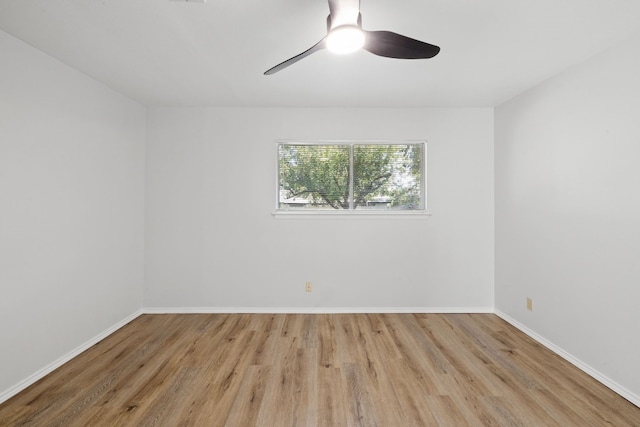 10001 Woodglen Dr, Austin, TX 78753 - empty room featuring ceiling fan and wood finished floors