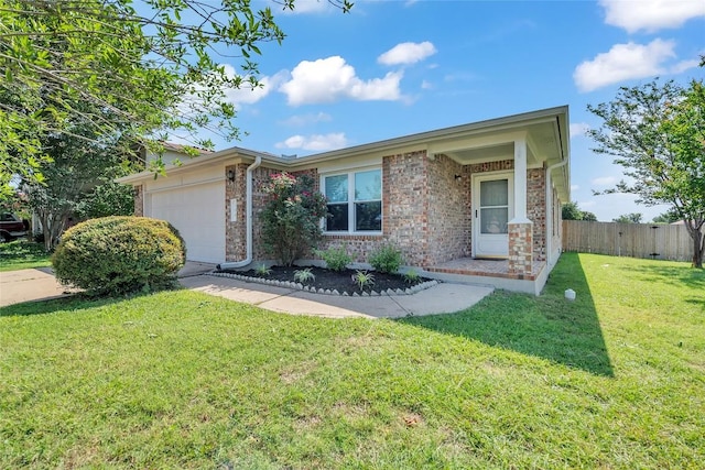 100 Grant Cv, Hutto, TX 78634 - ranch-style home featuring a garage and brick siding