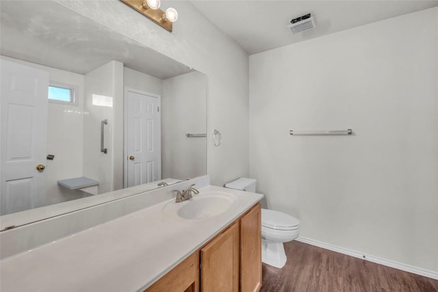 100 Grant Cv, Hutto, TX 78634 - bathroom featuring wood finished floors and vanity