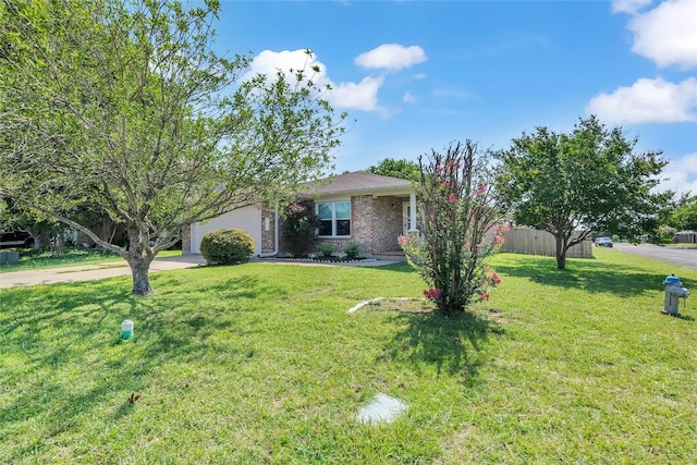 100 Grant Cv, Hutto, TX 78634 - view of front of property featuring a garage and driveway