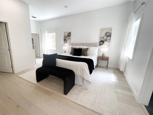 4508 Chiappero Trl, Austin, TX 78731 - bedroom featuring light wood-style floors and baseboards
