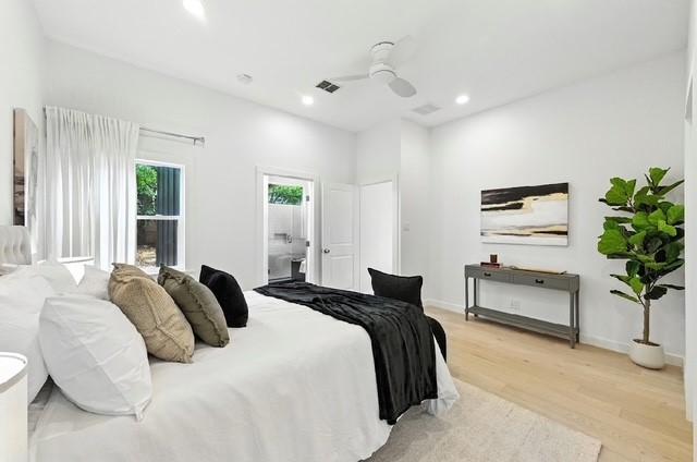 4508 Chiappero Trl, Austin, TX 78731 - bedroom with light wood-type flooring, recessed lighting, a ceiling fan, and ensuite bath
