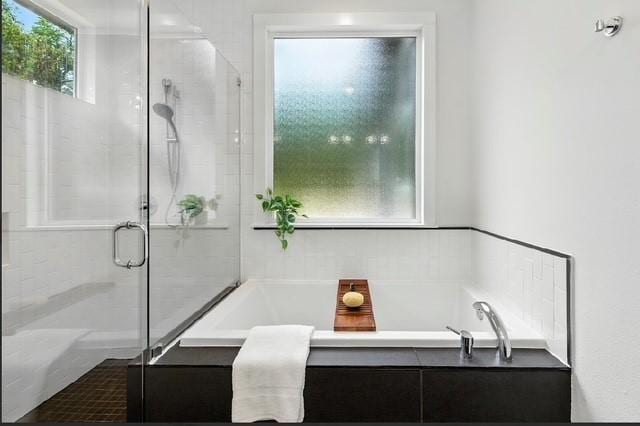 4508 Chiappero Trl, Austin, TX 78731 - full bathroom featuring a stall shower and a bath