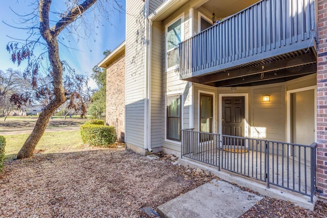 10616 Mellow Mdws Unit 17A, Austin, TX 78750 - doorway to property featuring a balcony
