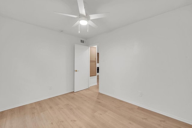 10616 Mellow Mdws Unit 17A, Austin, TX 78750 - empty room with light wood-type flooring and ceiling fan