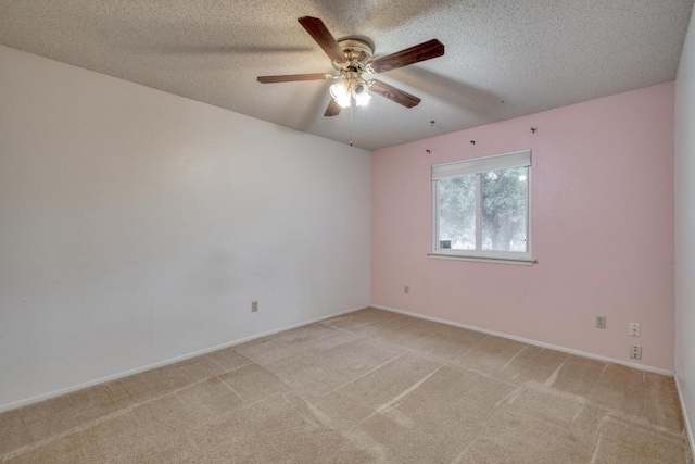4901 Transit Cir, Austin, TX 78727 - empty room with a ceiling fan, light colored carpet, and a textured ceiling