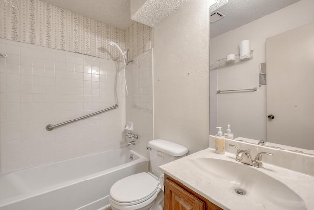 4901 Transit Cir, Austin, TX 78727 - full bathroom with vanity, bathing tub / shower combination, and a textured ceiling