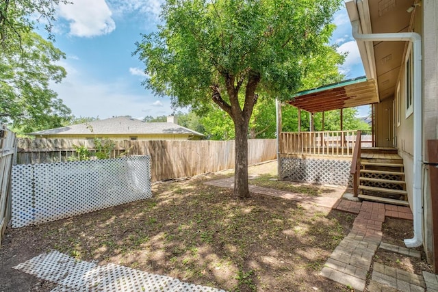 4901 Transit Cir, Austin, TX 78727 - fenced backyard with a wooden deck