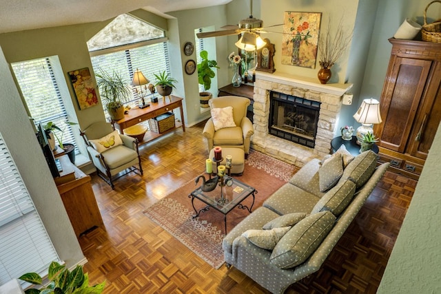 3508 Wendel Cv Unit H16, Austin, TX 78731 - living area featuring a fireplace, plenty of natural light, and a ceiling fan