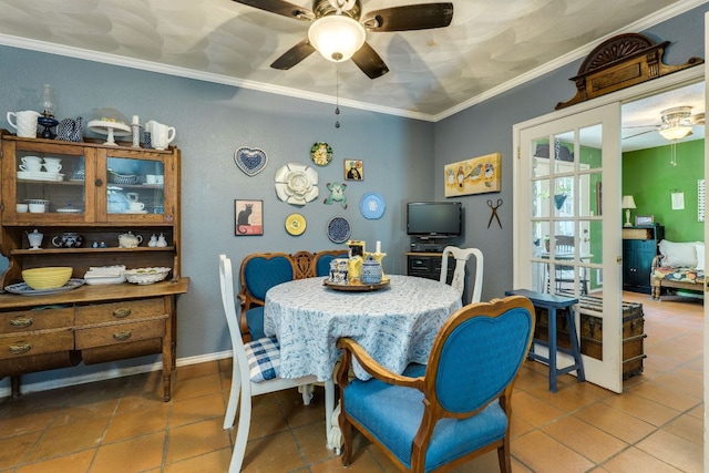 3508 Wendel Cv Unit H16, Austin, TX 78731 - tiled dining space featuring a ceiling fan and ornamental molding
