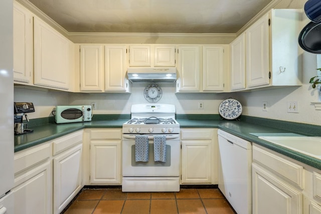 3508 Wendel Cv Unit H16, Austin, TX 78731 - kitchen with white appliances, under cabinet range hood, dark countertops, and dark tile patterned floors