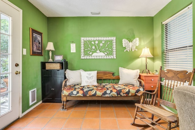 3508 Wendel Cv Unit H16, Austin, TX 78731 - living area featuring baseboards and tile patterned flooring