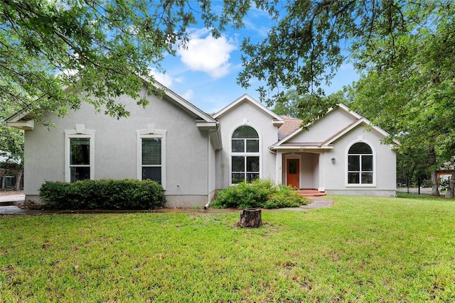 230 Cedar Hills Dr, Elgin, TX 78621 - view of front of home with stucco siding and a front lawn