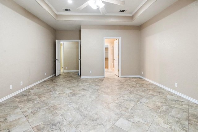 230 Cedar Hills Dr, Elgin, TX 78621 - unfurnished bedroom featuring a raised ceiling, ornamental molding, ceiling fan, and connected bathroom