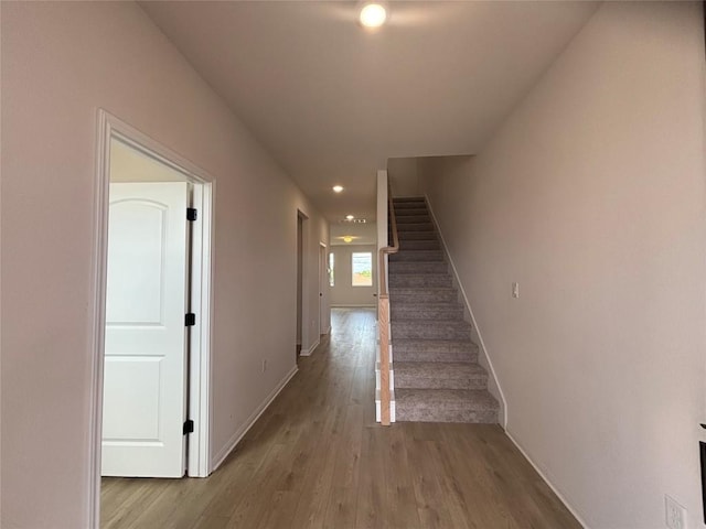 627 Palo Brea Loop, Hutto, TX 78634 - staircase featuring recessed lighting and wood finished floors