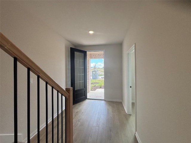 627 Palo Brea Loop, Hutto, TX 78634 - foyer featuring wood-type flooring and stairs