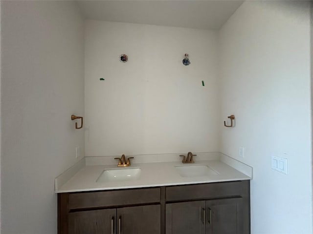 627 Palo Brea Loop, Hutto, TX 78634 - bathroom featuring double vanity