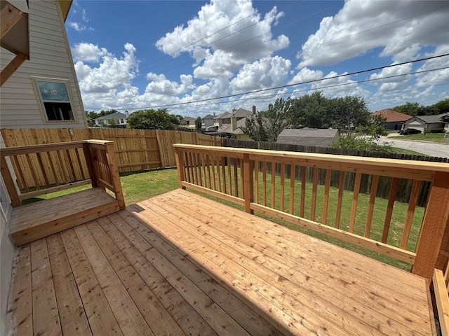 627 Palo Brea Loop, Hutto, TX 78634 - wooden terrace featuring a fenced backyard and a residential view