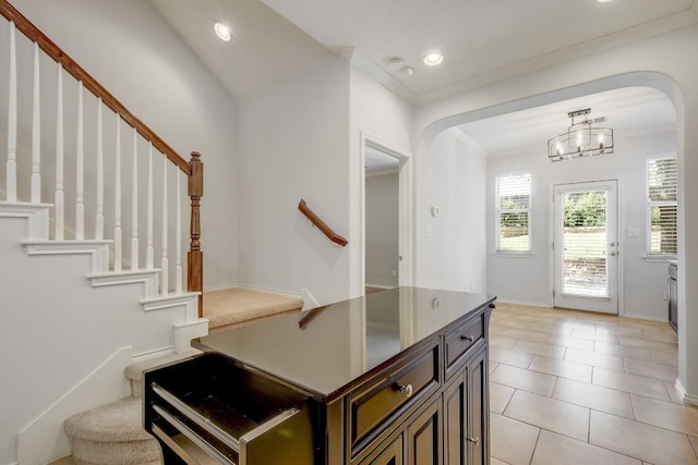 1209 Salem Park Ct, Austin, TX 78745 - entrance foyer featuring stairs, arched walkways, a chandelier, crown molding, and recessed lighting