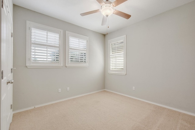 1209 Salem Park Ct, Austin, TX 78745 - carpeted spare room with baseboards and ceiling fan
