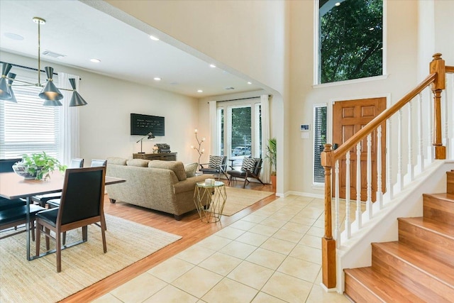13412 Snow Fall Dr, Austin, TX 78727 - entrance foyer with stairway, recessed lighting, and light tile patterned flooring