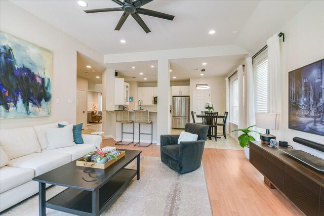 13412 Snow Fall Dr, Austin, TX 78727 - living area featuring ceiling fan, light wood-type flooring, and recessed lighting