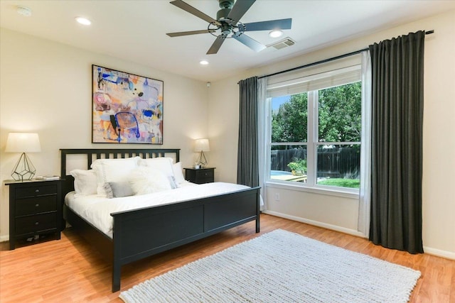 13412 Snow Fall Dr, Austin, TX 78727 - bedroom with light wood-style flooring, recessed lighting, and a ceiling fan