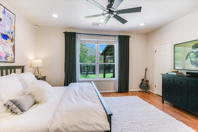 13412 Snow Fall Dr, Austin, TX 78727 - bedroom with light wood-style flooring, recessed lighting, and a ceiling fan