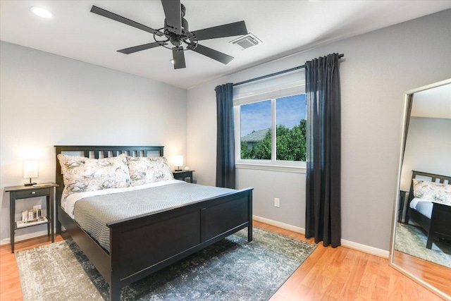 13412 Snow Fall Dr, Austin, TX 78727 - bedroom featuring wood finished floors, ceiling fan, and recessed lighting
