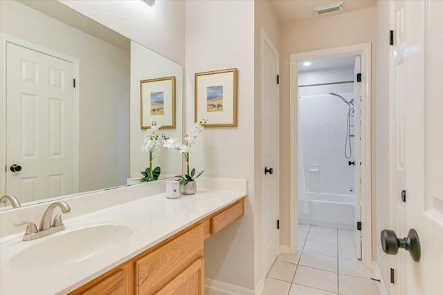 13412 Snow Fall Dr, Austin, TX 78727 - bathroom with vanity, tile patterned flooring, and washtub / shower combination