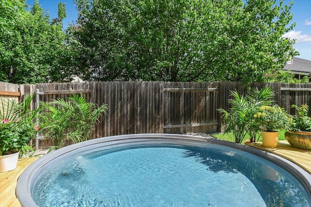 13412 Snow Fall Dr, Austin, TX 78727 - view of pool with a fenced backyard and a wooden deck