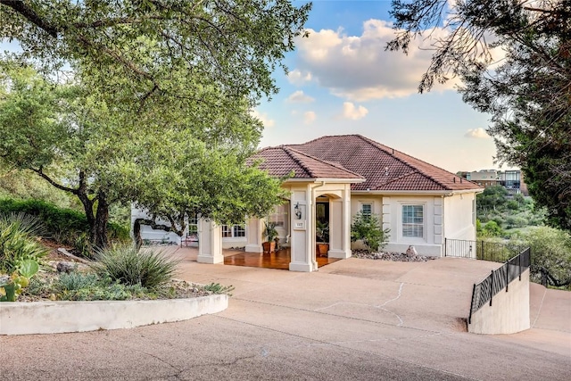1307 Osprey Ridge Loop, Lago Vista, TX 78645 - mediterranean / spanish home with stucco siding and a tile roof