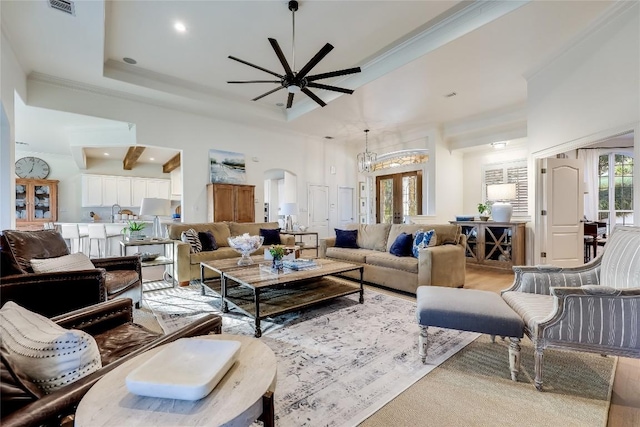 1307 Osprey Ridge Loop, Lago Vista, TX 78645 - living room with a ceiling fan, arched walkways, ornamental molding, a raised ceiling, and recessed lighting