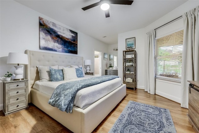 1307 Osprey Ridge Loop, Lago Vista, TX 78645 - bedroom with wood finished floors and ceiling fan