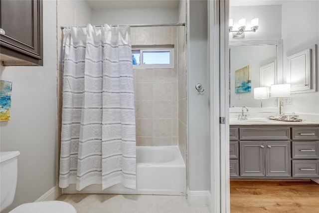 1307 Osprey Ridge Loop, Lago Vista, TX 78645 - full bathroom featuring vanity, shower / bath combo with shower curtain, and wood finished floors
