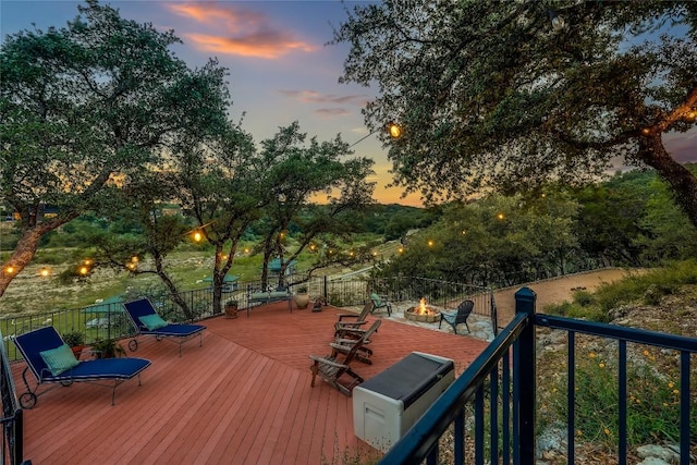 1307 Osprey Ridge Loop, Lago Vista, TX 78645 - wooden deck with an outdoor fire pit