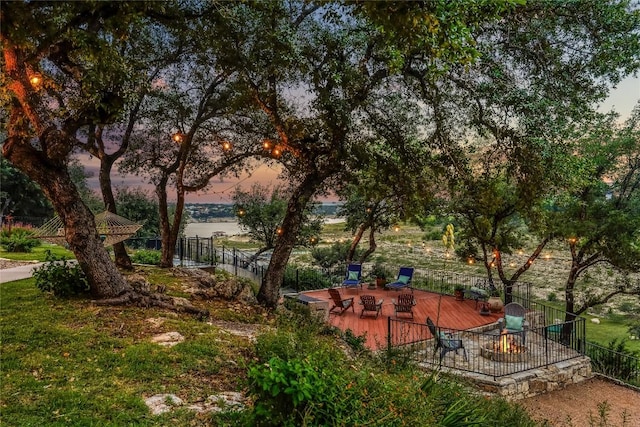 1307 Osprey Ridge Loop, Lago Vista, TX 78645 - view of yard with a deck and a fire pit