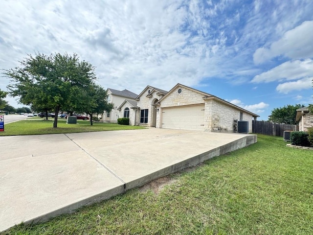 219 Memory Ln, Harker Heights, TX 76548 - view of front of home with driveway, an attached garage, and stone siding