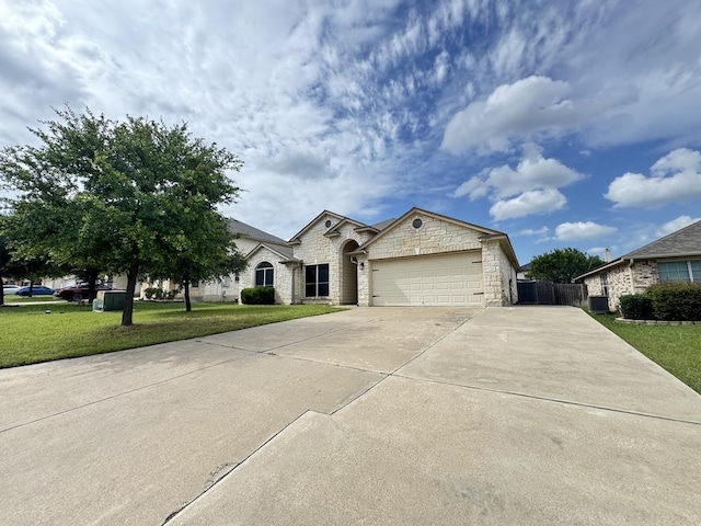 219 Memory Ln, Harker Heights, TX 76548 - french country home with driveway, an attached garage, and stone siding