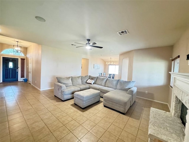 219 Memory Ln, Harker Heights, TX 76548 - living area with light tile patterned floors, a chandelier, a fireplace, and plenty of natural light