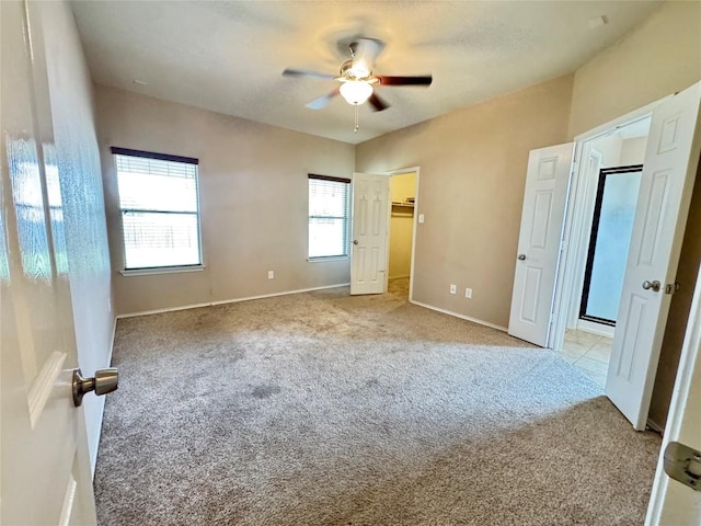 219 Memory Ln, Harker Heights, TX 76548 - unfurnished bedroom with carpet floors, a ceiling fan, and a spacious closet