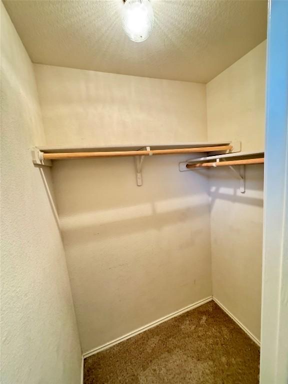 219 Memory Ln, Harker Heights, TX 76548 - spacious closet featuring dark colored carpet