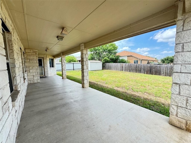 219 Memory Ln, Harker Heights, TX 76548 - fenced backyard featuring a patio and a storage shed