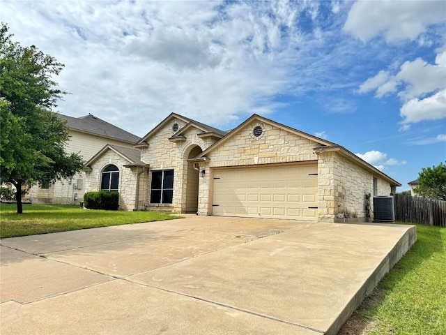 219 Memory Ln, Harker Heights, TX 76548 - french country inspired facade featuring a garage, stone siding, and driveway