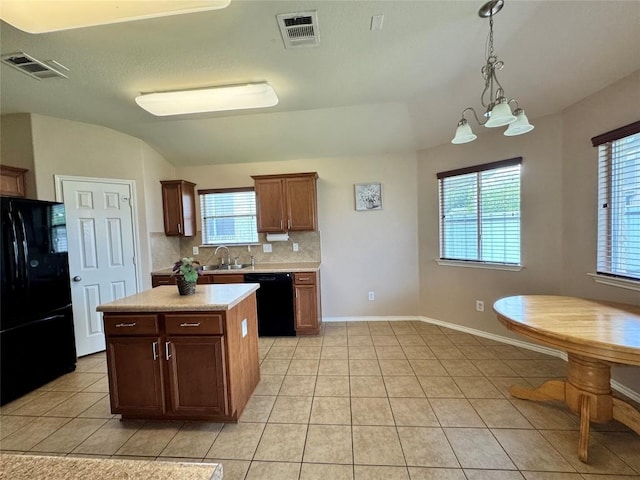 219 Memory Ln, Harker Heights, TX 76548 - kitchen with black appliances, light countertops, light tile patterned flooring, tasteful backsplash, and healthy amount of natural light