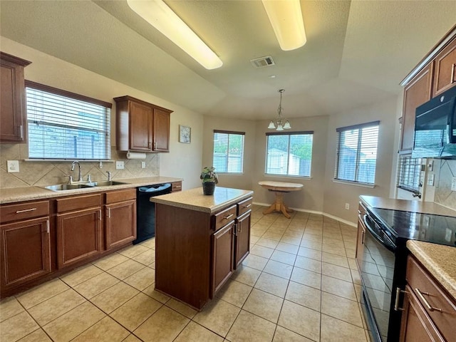 219 Memory Ln, Harker Heights, TX 76548 - kitchen featuring black appliances, light tile patterned floors, tasteful backsplash, a chandelier, and light countertops