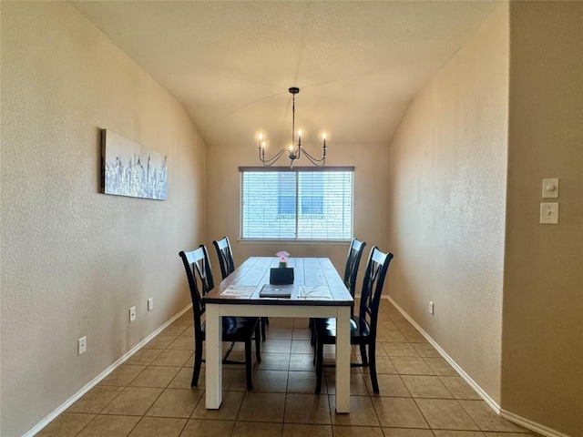 219 Memory Ln, Harker Heights, TX 76548 - dining area featuring a chandelier, a textured wall, light tile patterned floors, and vaulted ceiling